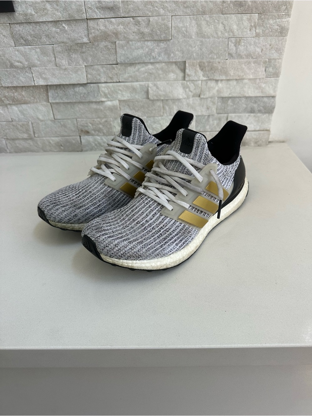 adidas Grey Knit Ultraboost Sneakers with Gold Accents